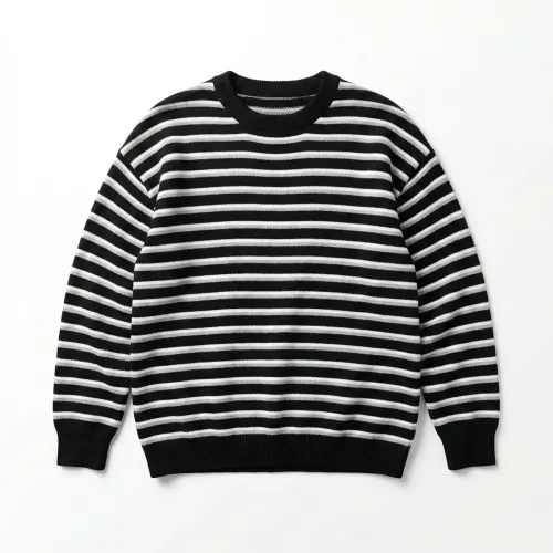 Жіночий светр у смужку оверсайз. В'язаний джемпер тільняшка чорно-білий