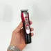 Машинка для стрижки 10в1 GEMEI GM-592, окантовочная машинка, подстригательная машинка. Цвет: красный